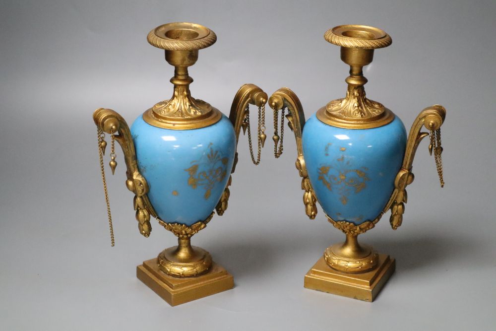 A pair of Sevres style porcelain and spelter vases